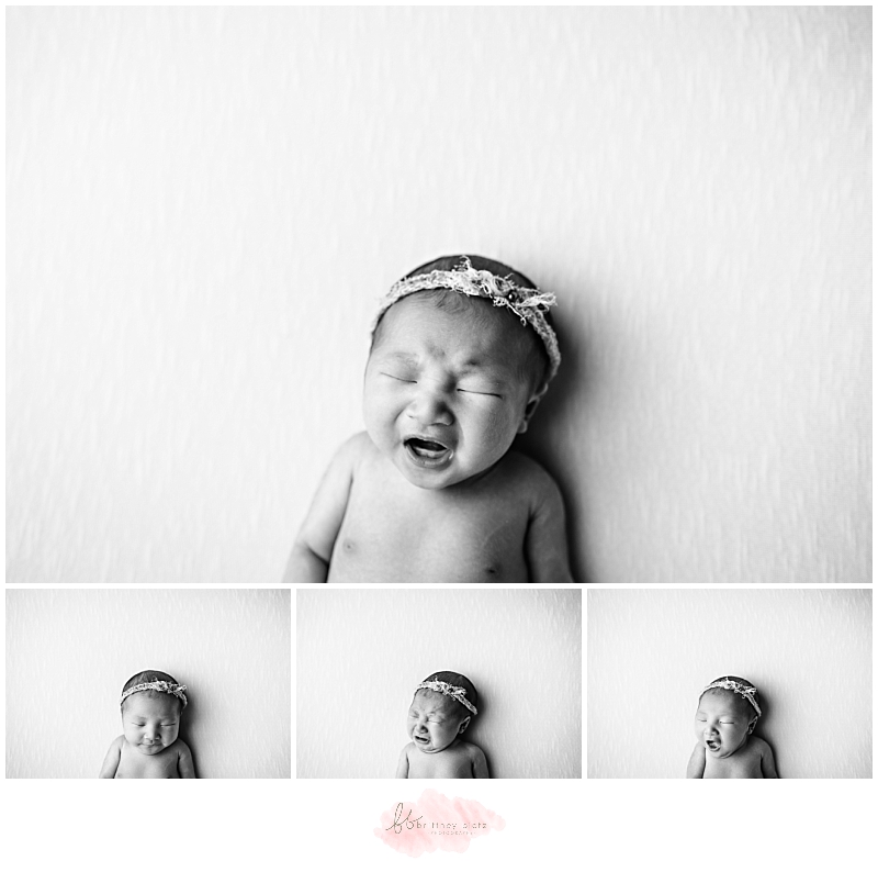 Black and white simple photo of newborn baby girl in Calgary